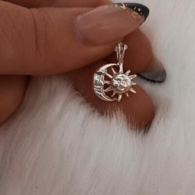 Dije de plata sol y luna