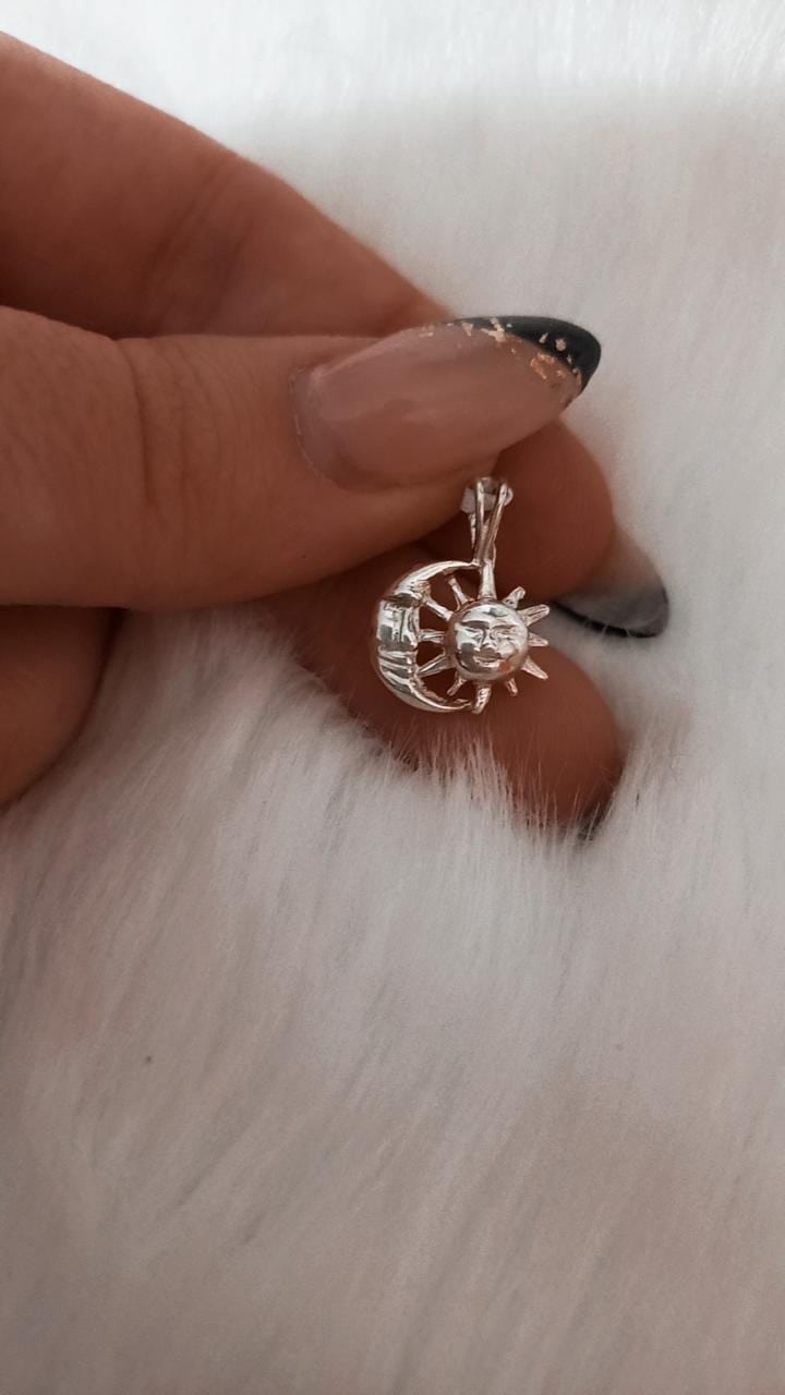 Dije de plata sol y luna