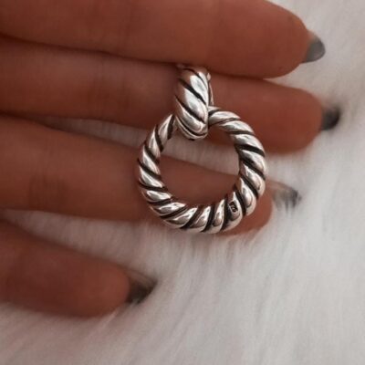 Dije argolla de plata inflada