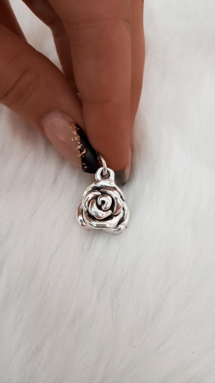 Dije de plata inflada Rosa